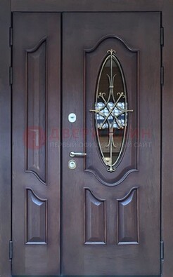 Темная металлическая дверь Винорит со стеклом и ковкой ДСК-239 в Воронеже