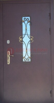 Металлическая дверь со стеклом и ковкой ДСК-77 в Воронеже